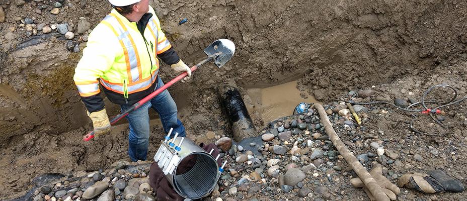 Fixing a water main break in Quesnel