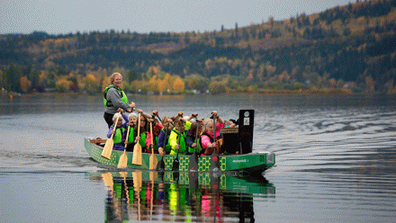 Dragon boat racers paddling on Dragon Lake