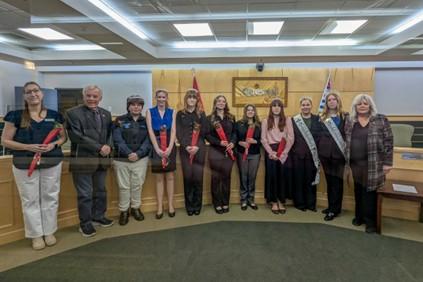 Quesnel Ambassadors stand with Mayor Paull and Councillor McKelvie for a group photo